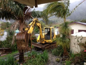 Diggers get to work on house demolition